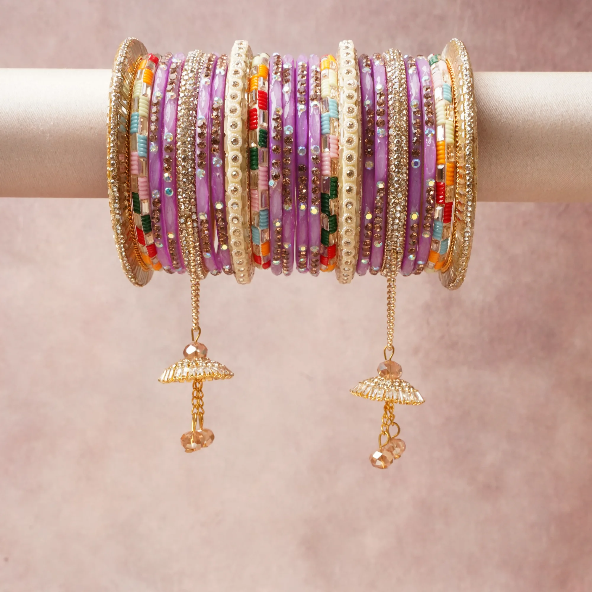 A commanding Lavender anchors this beautiful set, enriched with accents of Gold, Clear, White, Red, Orange, Light Green, Sky Blue, Pink, Beige, Champagne that add depth and dimension.

Featuring a striking composition of Glass, Gold-toned Metal, Rhinestones, Resin, Faceted Glass, this set carries intricate craftsmanship and strong presence. Grand in form, it is created for moments that deserve to be marked.